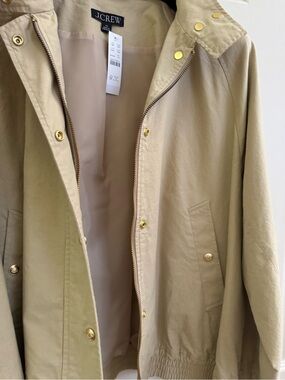 NWT, JCrew bomber jacket in a tan / butter .